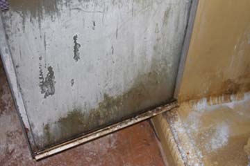 Hard water stains on shower enclosure in a home in Redlands 