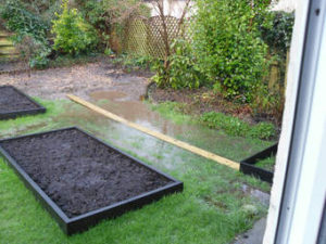 flooded yard due to not gutter cleaning