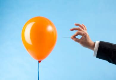 inflation represented by a balloon popping